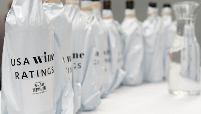 Wines are judged blind for their quality and value, and then packages are shown for the package score.
