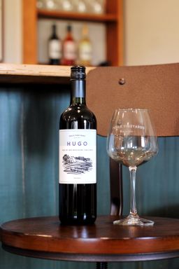 Logo for: Hugo - Semi Dry Red Muscadine Wine